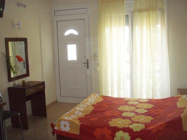 Golden Sun Apartment โรเวียส ห้อง รูปภาพ